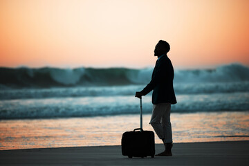 sunset, beach and man with suitcase for travel, vacation and break in nature with freedom and solo t