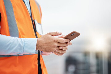 Phone, architecture and hands of man in city for engineering, construction site and communication. Building, social media and mobile app with closeup of contractor for contact, networking and mockup