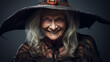 © Mari - A good old smiling witch in a black dress and a magic hat on a dark background