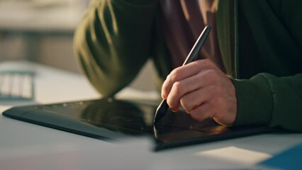 Wall Mural - Closeup designer hand drawing tablet table. Busy artist talk phone working pad
