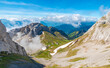 Panoramic view of the Matthorn summit, one of the multiple peaks of Mount Pilatus south of Lucerne. On the left you can see tracks of the cogwheel railway and on the right is the Flower Trail.