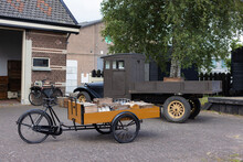 Vintage Milk Float With A Tricycle Carrying Milk 