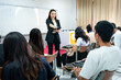 © EduLife Photos - University lecturer teaching students in classroom