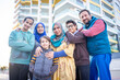 © Jasmin Merdan - Real Muslim family on city street together