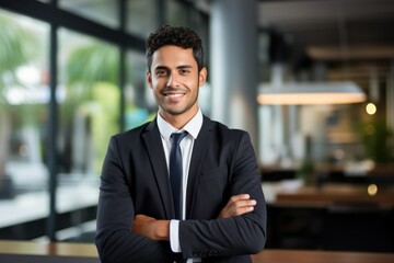 Portrait of a fictional businessman in suit smiling in an office. Generative AI.