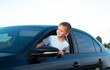 © Inna - Little boy in the car is happy at the wheel of car holding steering wheel