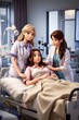 © Sagar - Three female doctors and patient in a hospital ward. Focus on the doctor