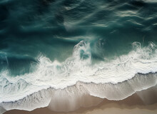 Aerial View Of A Beautiful Beach With Waves Breaking On The Sand. High Quality Photo