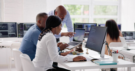 Wall Mural - african business team working on computer