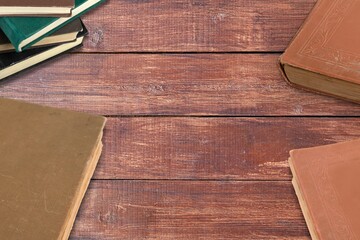 Poster - Old retro reading book on wooden desk