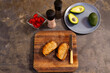 © Wavebreak Media - Close up of slices of bread and avocado in kitchen at home