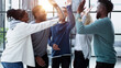© Katsiaryna - Group of happy colleagues feel motivated giving high five