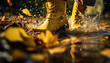 person jumping in muddy puddle on rainy fall day in rain boots