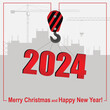 Happy New Year and Merry Christmas concept. A crane lifts the symbol of 2024 against the backdrop of a construction site.
