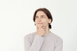 © millaf (Nemchinova) - Handsome man thinking and looking up on white background