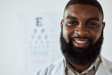 Wall Mural - Optometrist, face and portrait of man with smile with trust for eye care services, healthcare consultation and clinic assessment. Happy African optician with pride for medical analysis of eyes