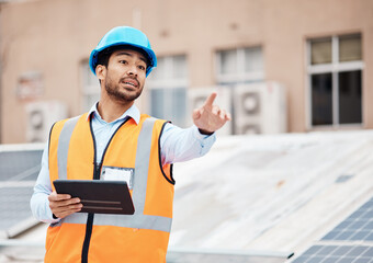 Poster - Tablet, planning and male construction worker on a rooftop of a building for inspection or maintenance. Industry, engineering and young man foreman with digital technology working in an urban town.