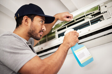 Canvas Print - Air conditioner, cleaning and man with electrical machine check in a home with ac repair. Maintenance, spray and system wash for installation, inspection of aircon fix in a house with contractor