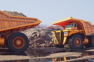 Giant fleet of yellow dump trucks carrying a heavy load on a wet gravel road