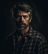 © Ogzkblyhn/Wirestock Creators - AI generated illustration of a mature man with a full beard and a plaid shirt on a black background