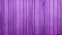 Purple Wooden Background Or Texture With Vertical Planks And Knots.