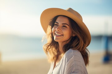 Wall Mural - Happy beautiful young woman smiling at the beach side - Delightful girl enjoying sunny day out - Healthy lifestyle concept with female laughing outside generative AI