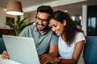 Multiracial young couple watching computer laptop sitting on the sofa at home - Happy diverse husband and wife using pc online services - Technology life style concept generative AI