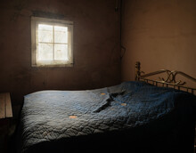 Soft Light Streams Through The Window Of A Bedroom In A Hotel In The Ghost Town Of Folsom, New Mexico