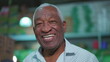 © Marco - Happy African American Elderly Man close-up face smiling. One black senior friendly charismatic person