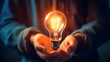 © Tepsarit - 2 Hands holding a light bulb. New idea innovation concept. Creative and innovation inspiration. Digital illustration generative AI.