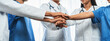 © InfiniteFlow - Group of medical staff doctor nurse and healthcare specialist profession coordinating synergy hand in hospital. Medical teamwork and healthcare cooperation in panoramic banner background. Neoteric