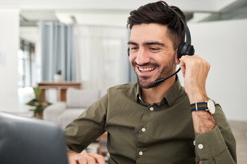 Man, remote work and virtual assistant with headphones at laptop for video call, voip communication and telemarketing. Happy sales agent, computer and microphone for customer support in home office