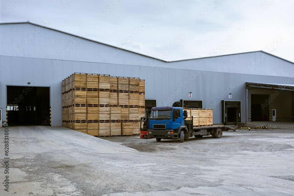 Cargo terminal of the logistics center. The truck in which the boxes ...
