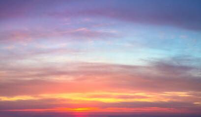 Wall Mural - gentle ligth colors of sunrise sundown sky with pastel light clouds, real sky