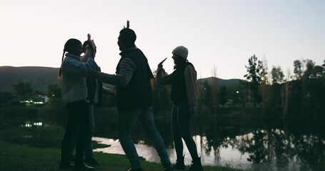 Sticker - Night, high five and friends in celebration while camping happy for party by the lake together in forest or the woods. Winning, success and silhouette of excited group of people on vacation in sunset