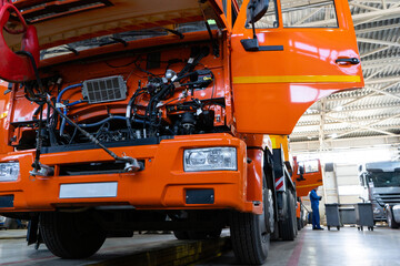 Fototapete - Trucks repair in car service.