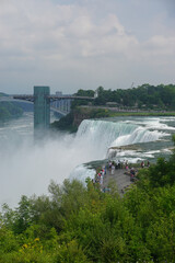 Wall Mural - Niagara Falls, NY: Tourists on Luna Island enjoy the view of the Niagara Gorge through the mist.