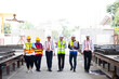 © NVB Stocker - Ethnic diversity worker people. Success teamwork. Group of professional Construction engineering people wearing hardhat safety helmet meeting at Prefabricated concrete walls Industry