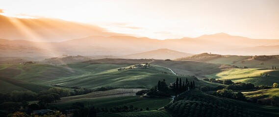 Poster - Stunning image captures the beauty of Val d'orcia in Tuscany, Italy during the golden hour