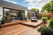 canvas print picture - The renovation of a modern home extension in Melbourne includes the addition of a deck, patio, and courtyard area.