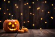 © Anatolii - Halloween holiday concept with jack o lantern glitter pumpkin decor on wooden table