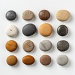 collection of various pebble stones isolated on white background, top view