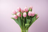 Fototapeta Tulipany - Natural bouquet of spring tulips. Pink tulips on a plain background.GenerativeAI.