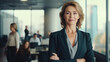 © banthita166 - portrait of a businesswoman. smile and relaxing . miidle age of woman and team .  office and tower view background.