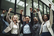 © sommersby - Group of excited diversity coworkers with raised hands celebrate business success