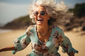 Canvas Print - happy senior woman on the beach enjoying her retirement