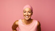 © Tamara - Young beautiful woman wearing pink head scarf over isolated pink background screaming proud and celebrating victory and success very excited