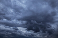 Epic Dramatic Storm Rainy Sky With Dark Grey Blue Cumulus Rain Clouds Background Texture, Thunderstorm