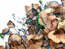 Pile Of Colorful Wooden Pencil Shavings On A White Background
