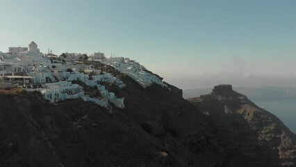 Canvas Print - Landscape drone footage over houses of Santorini Island,Thera by Aegean Sea, Greece